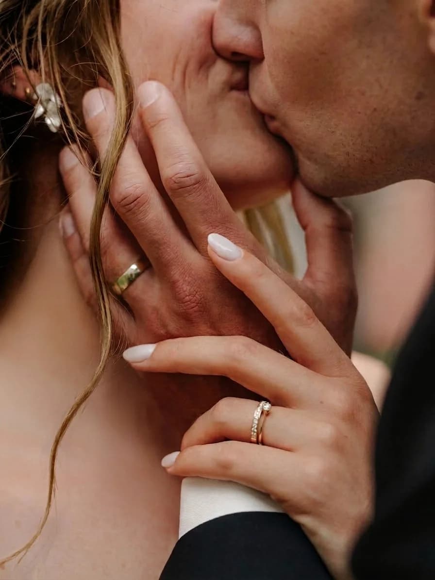 Newlyweds sharing a kiss